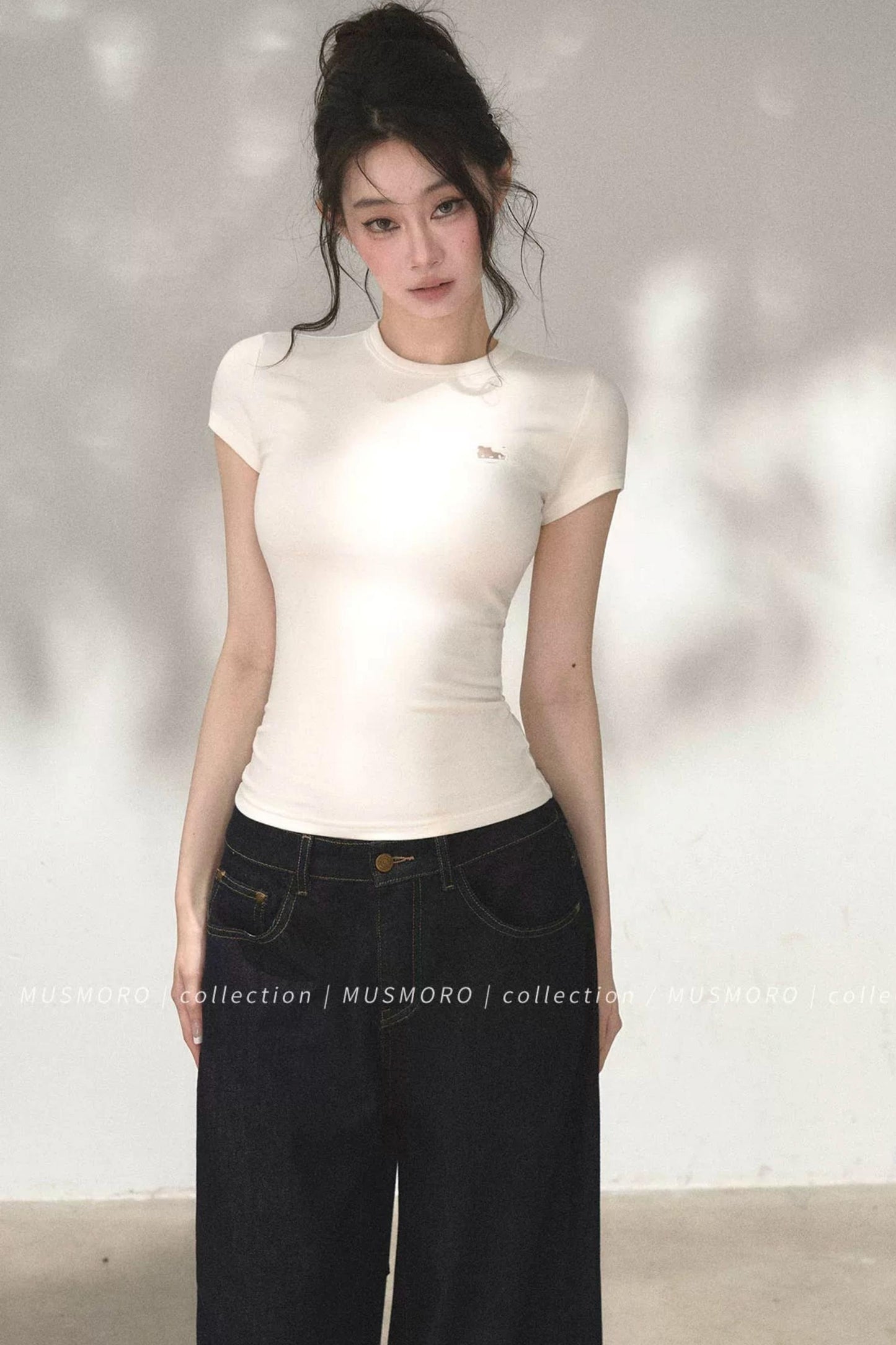 Top in maglia traforata ricamata