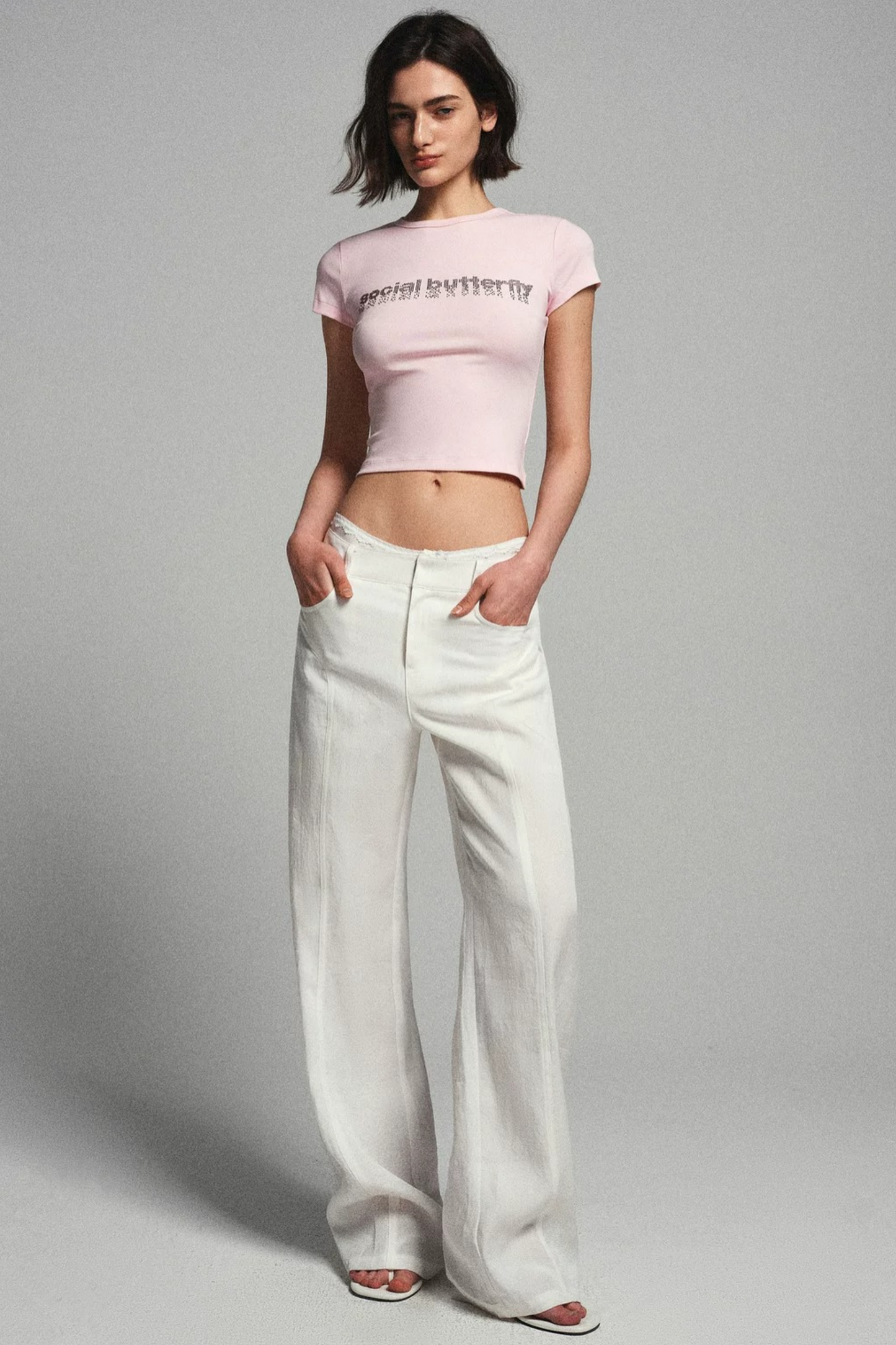Maglia narrativa rosa con strass