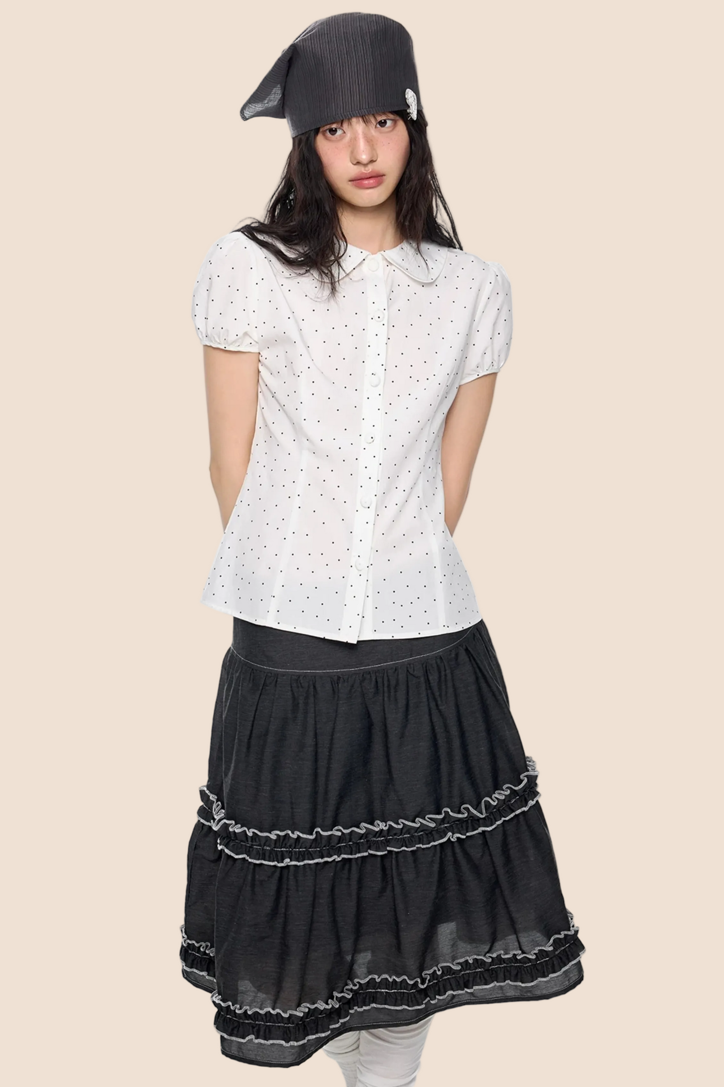 Blusa a pois con maniche a sbuffo