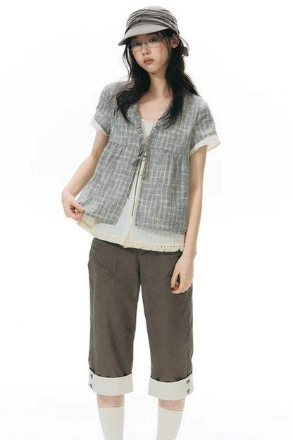 Camicia a quadri con volant e scollo a V