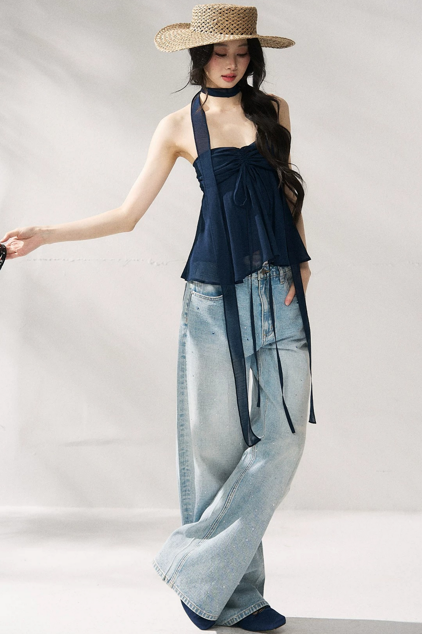 Pantaloni in denim blu a gamba dritta