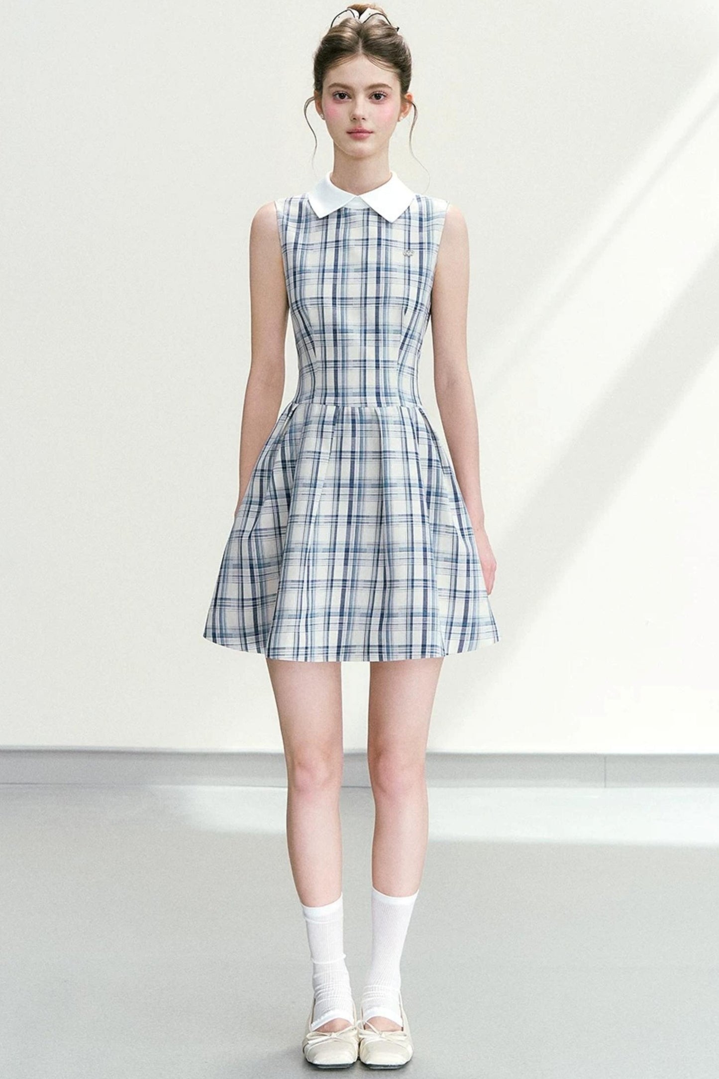 Abito elegante a quadri blu