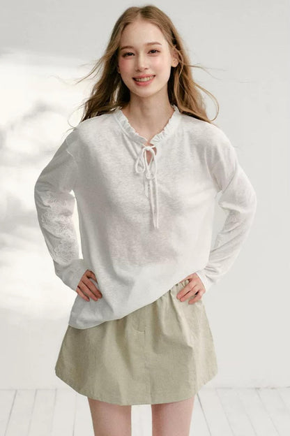 Hollow Floral Tie-Up Blouse