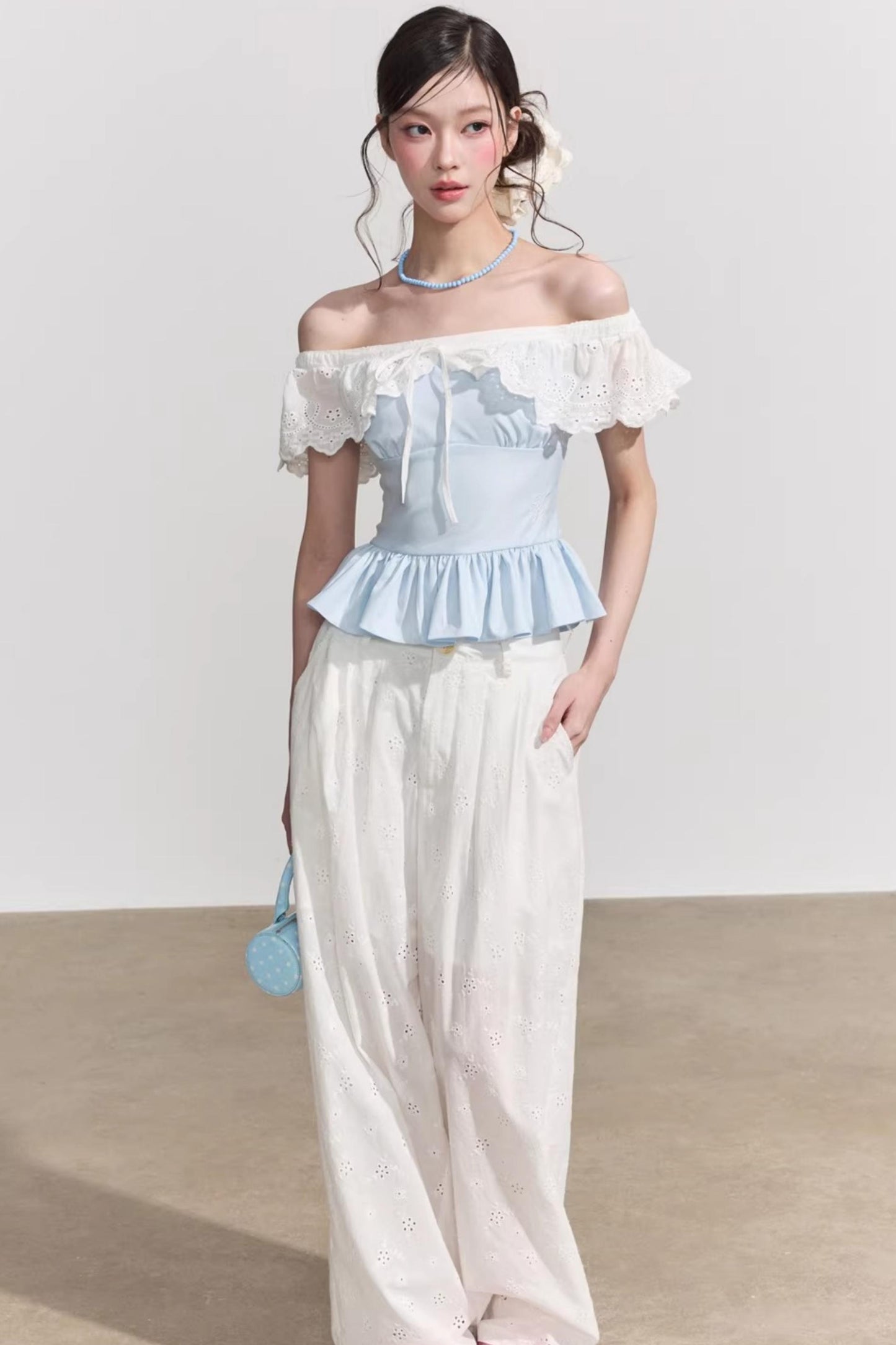 Blusa francese a fiori con volant