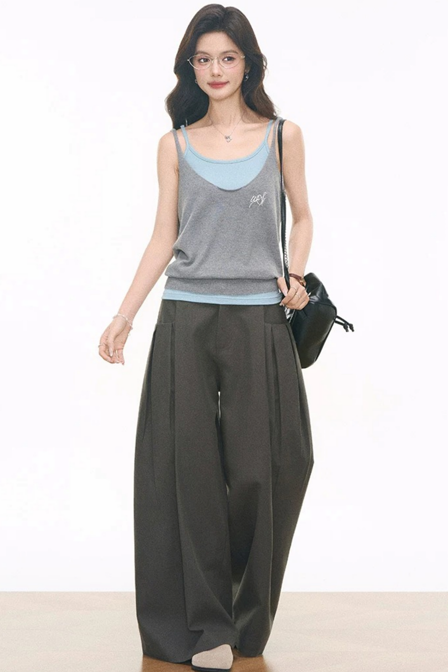 Completo canotta, gilet e pantaloni a maglia