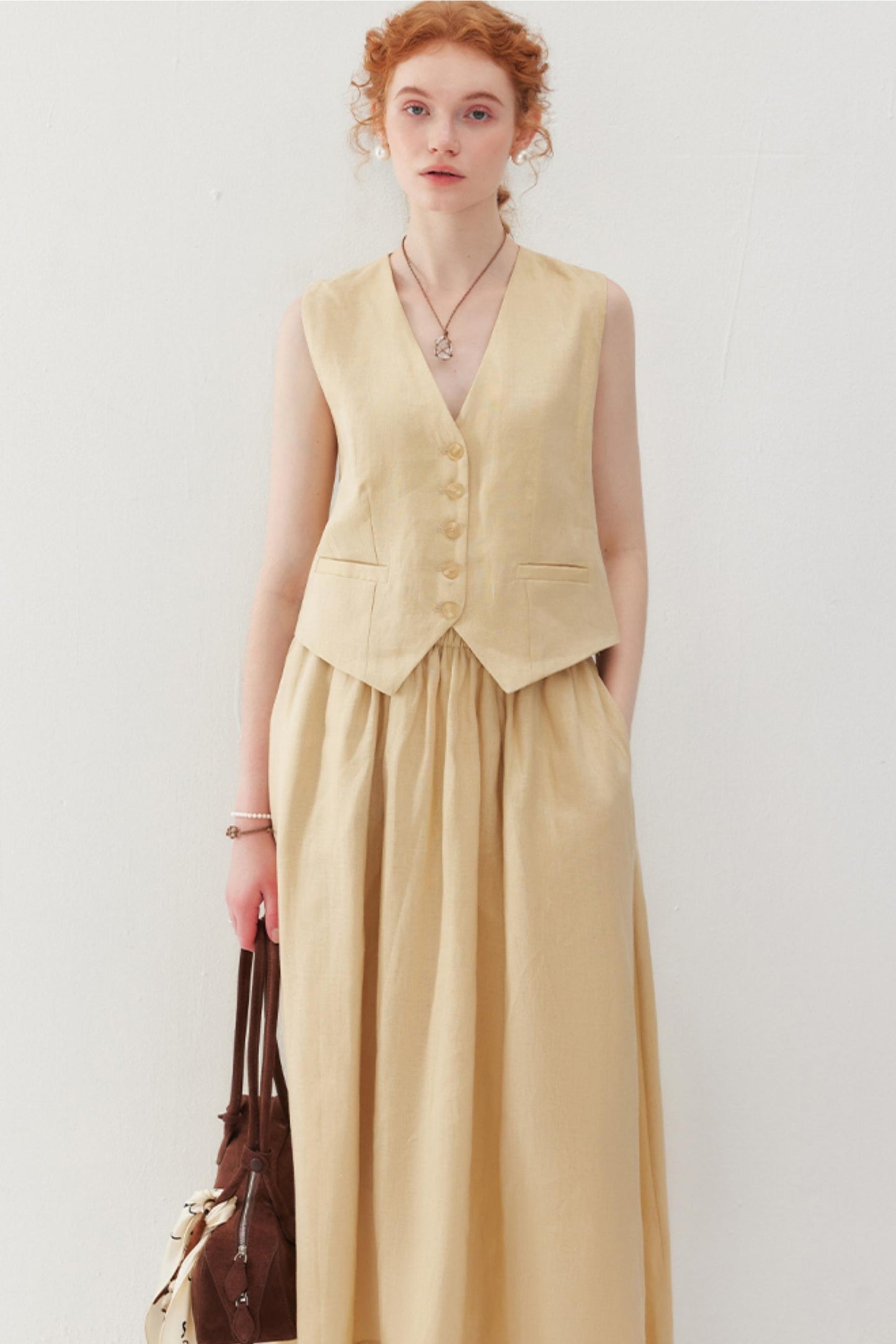 Elegant V-Neck & Pleated Skirt Set