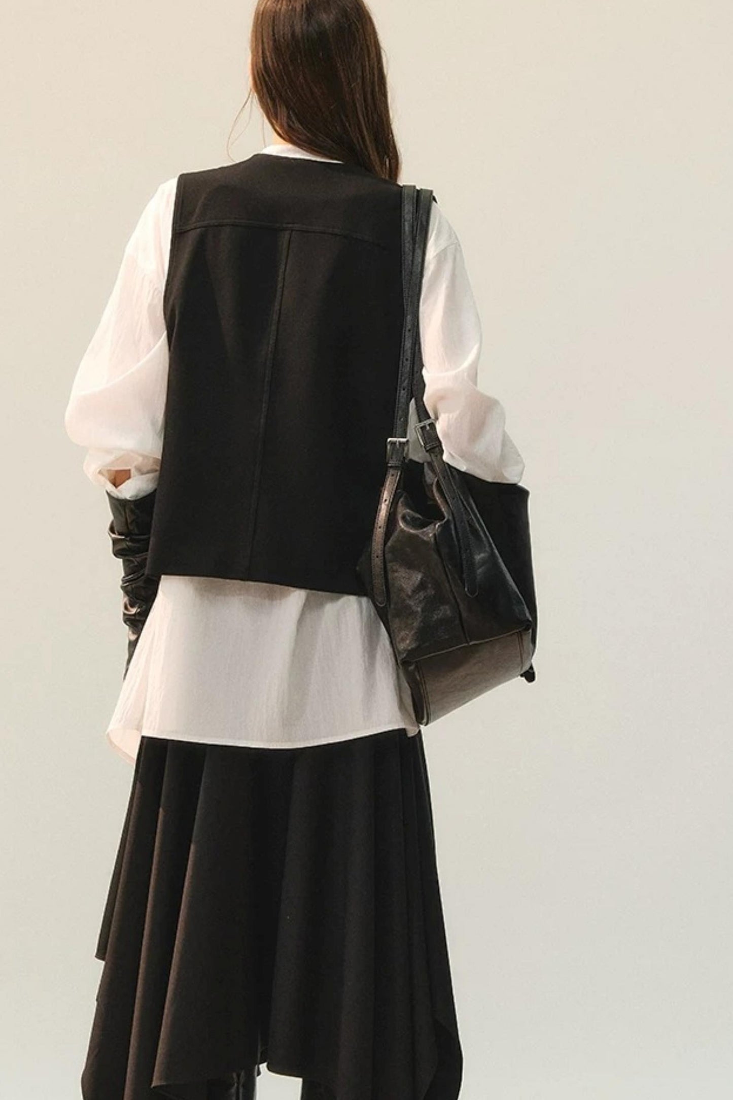 Completo rétro con gilet e gonna con perline