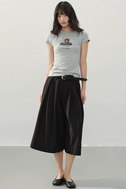 Pantaloni neri drappeggiati a gamba larga