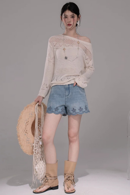 Pantaloni in denim lavato con ricamo laser