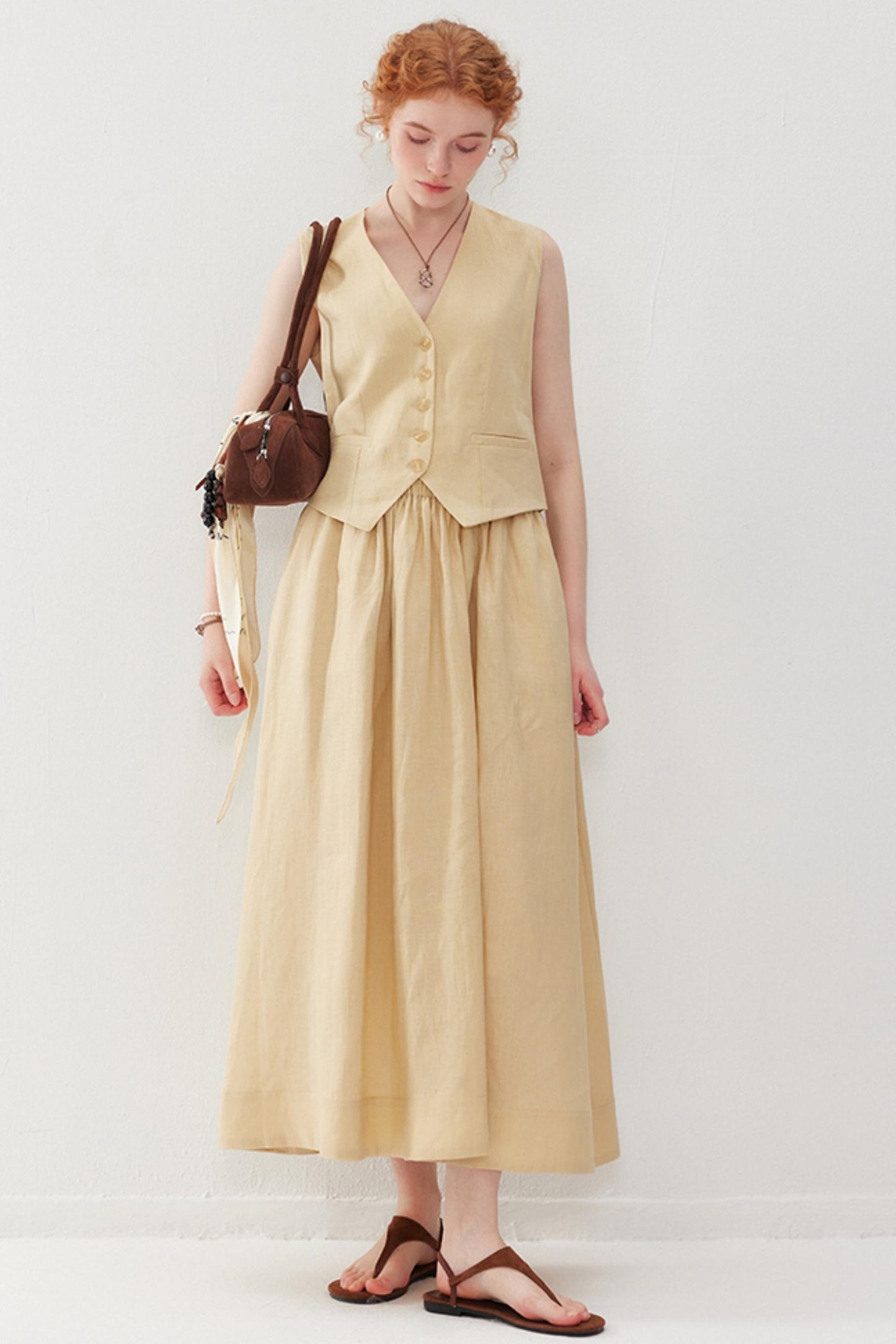 Elegant V-Neck & Pleated Skirt Set