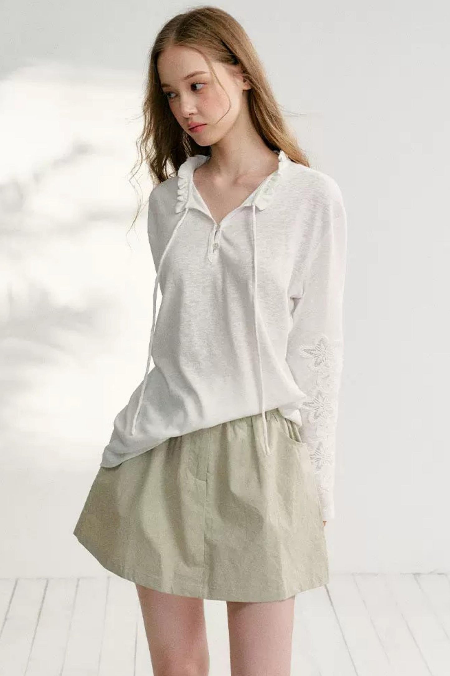 Hollow Floral Tie-Up Blouse