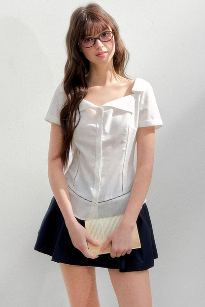 Blusa retrò rosa con risvolto