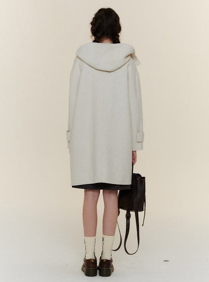 Long and short horn buttoned woolen Coat