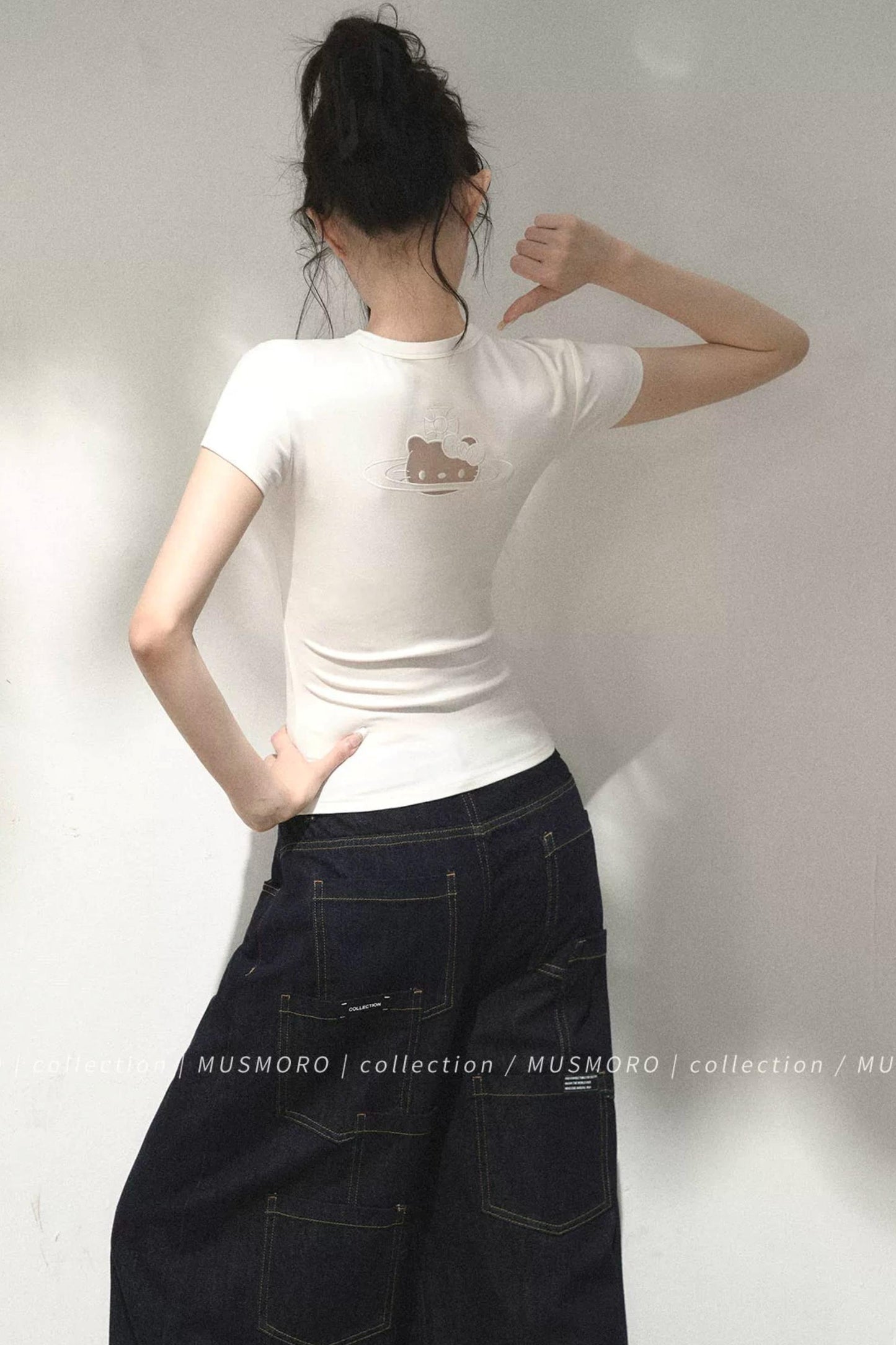 Top in maglia traforata ricamata