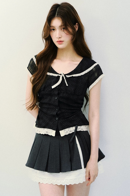 Blusa retrò blu navy a pois