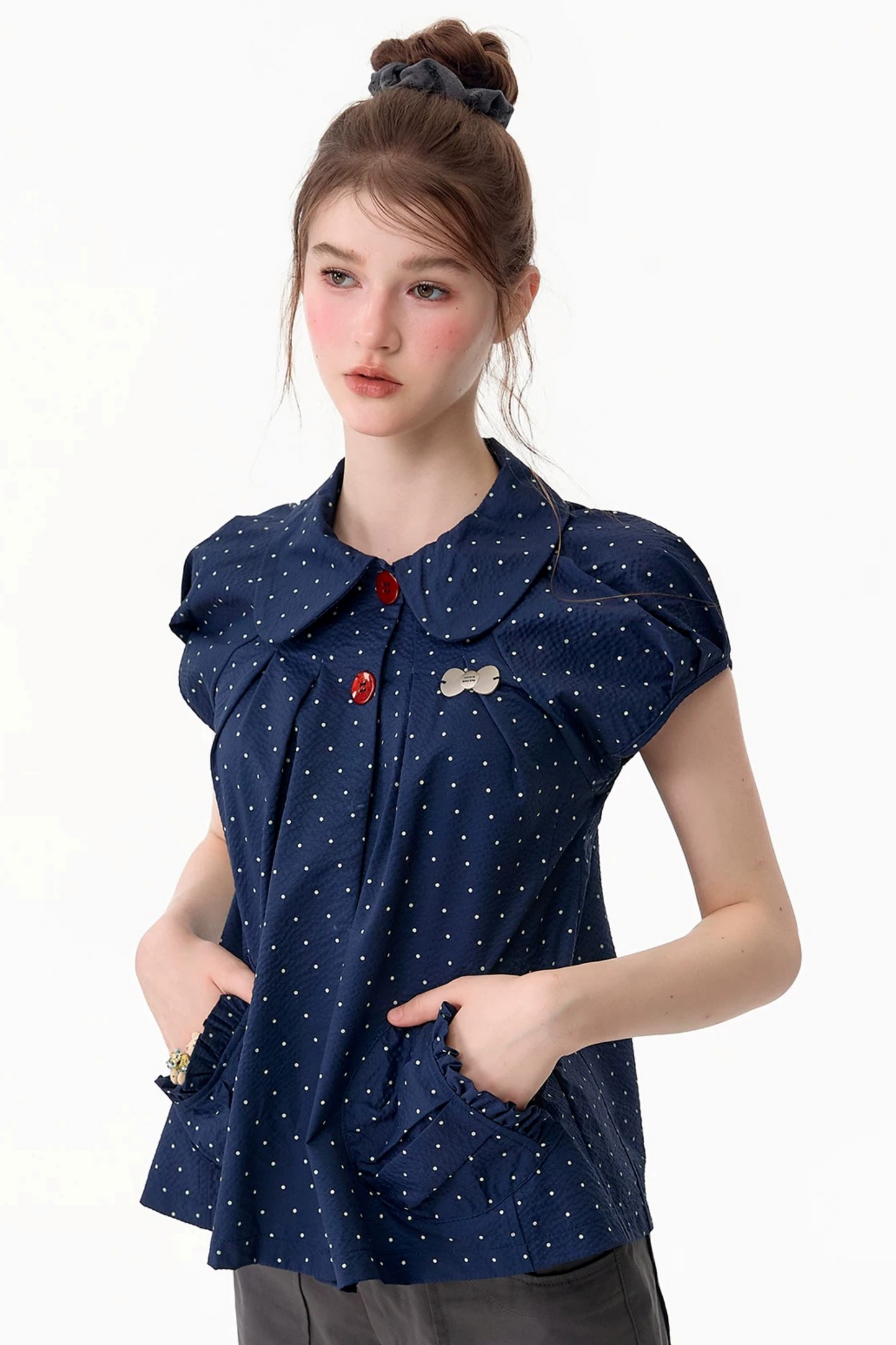 Maglia aderente retrò con colletto Peter Pan a pois