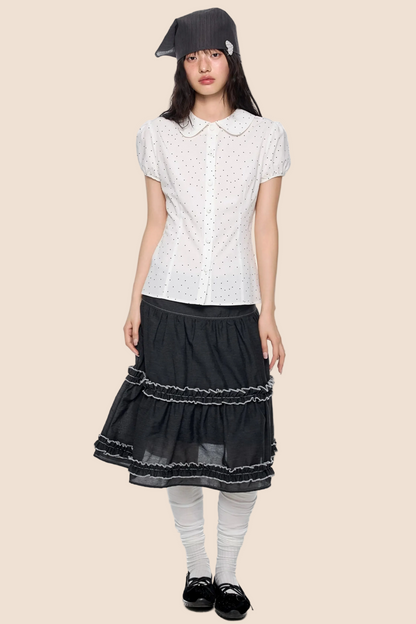 Blusa a pois con maniche a sbuffo