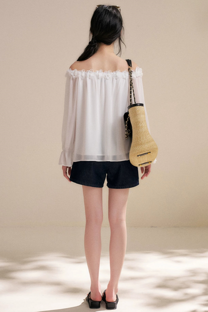 Blusa de gasa con flores tridimensionales