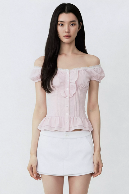 Conjunto de blusa con volantes rosa puro