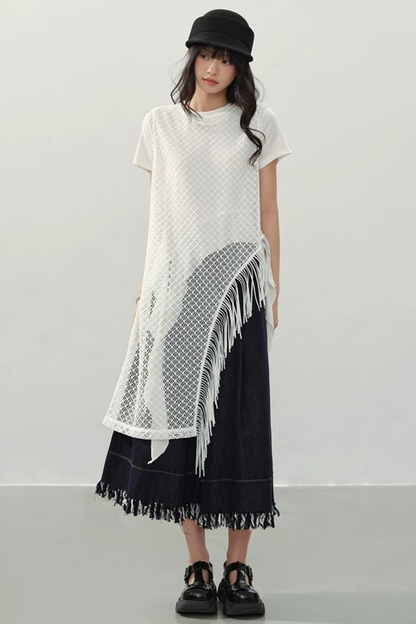 Robe à franges tissée avec découpes irrégulières