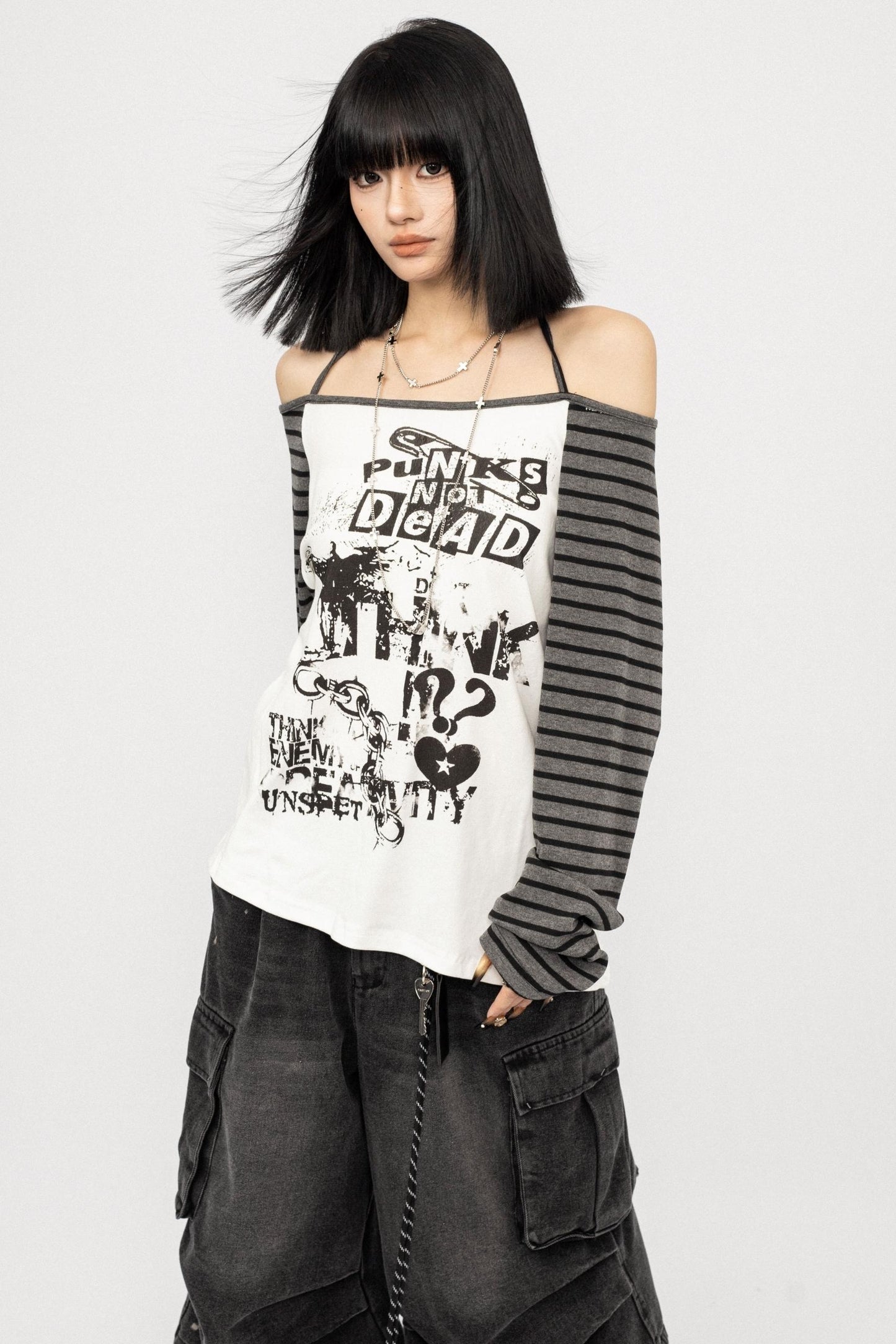 Loose Fit Spliced One-Shoulder Top