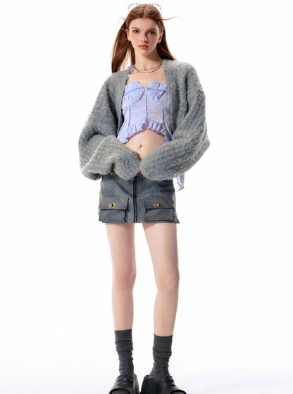 Denim tank top and knitted outer jacket