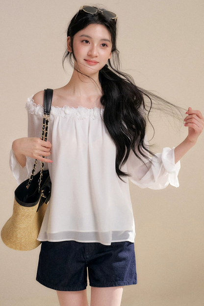 Blusa de gasa con flores tridimensionales