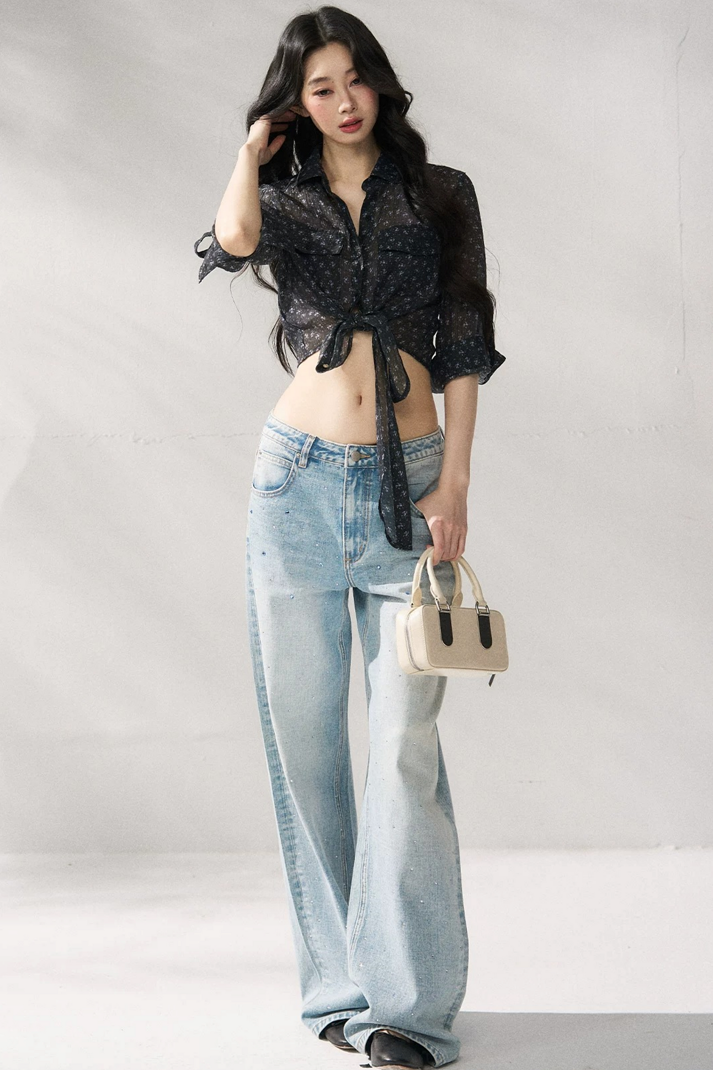 Pantaloni in denim blu a gamba dritta