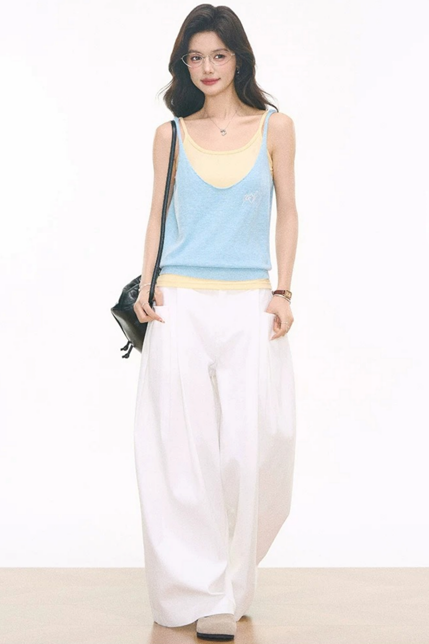 Completo canotta, gilet e pantaloni a maglia