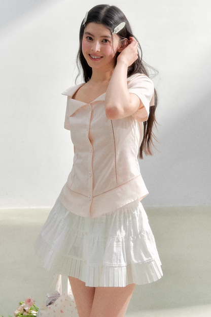 Blusa retrò rosa con risvolto