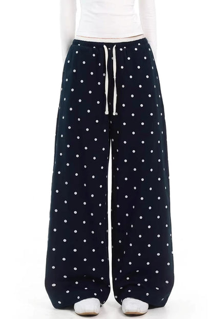 Pantaloni lunghi ampi e modellanti