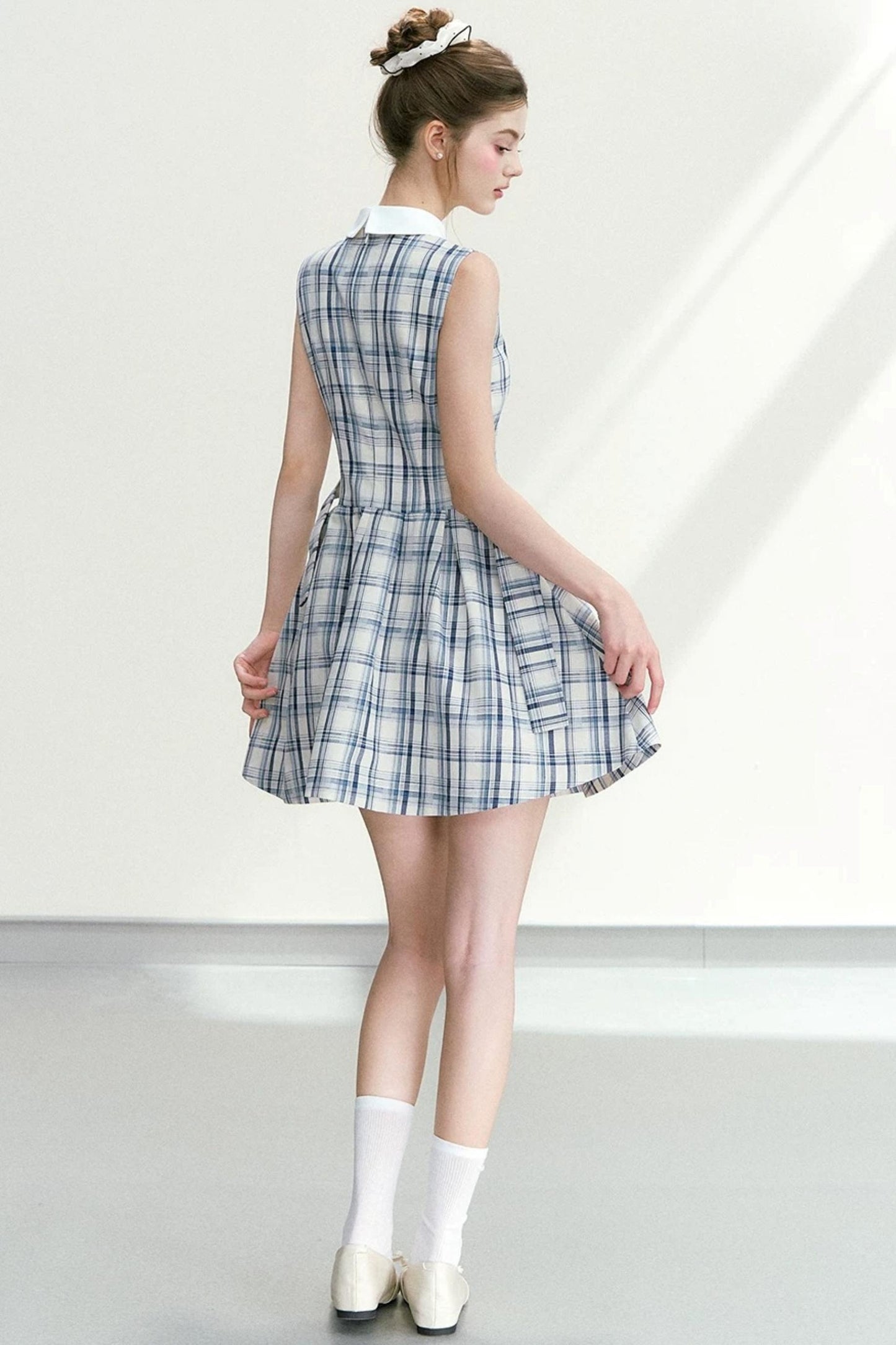 Abito elegante a quadri blu
