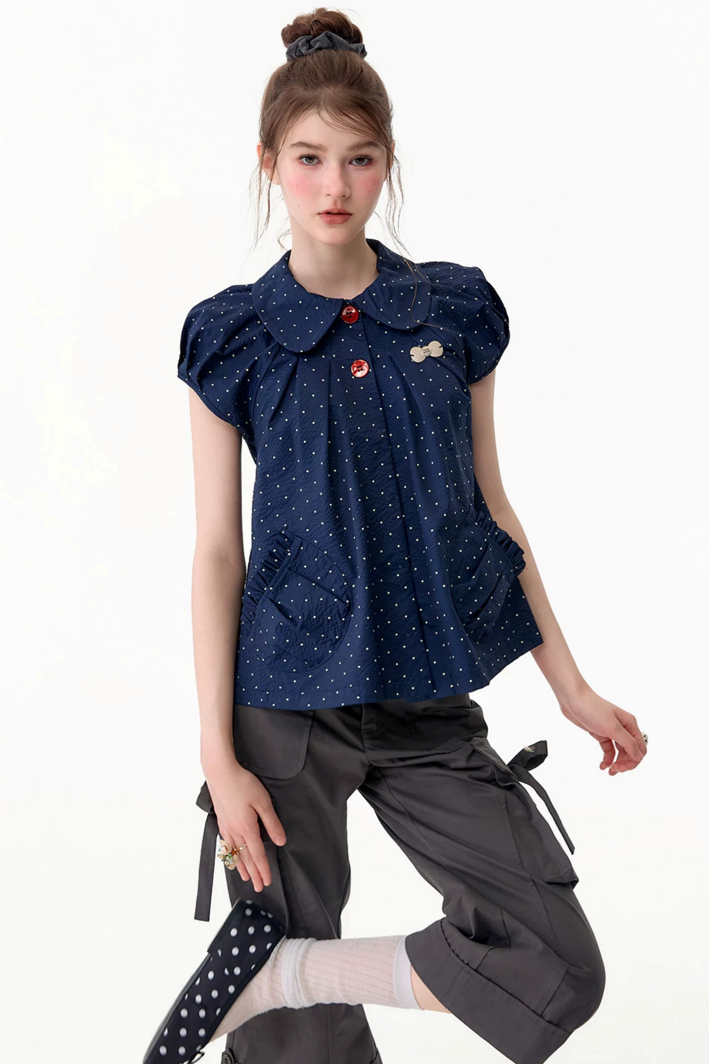 Maglia aderente retrò con colletto Peter Pan a pois