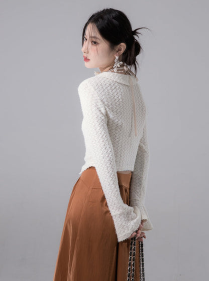 Velvety lace bridging cut-out knit top