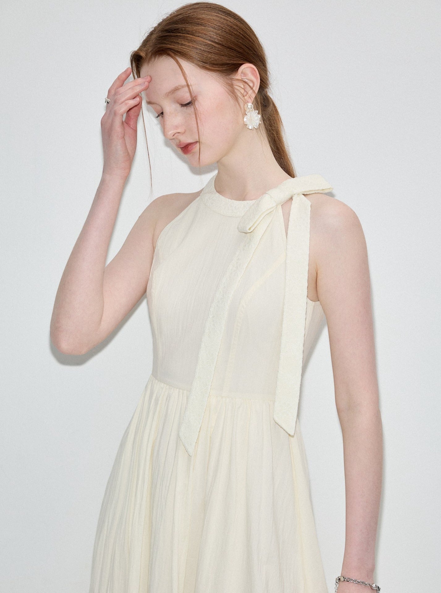 Age-Reducing Halter Dress