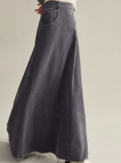 Tasseled raw A-line skirt