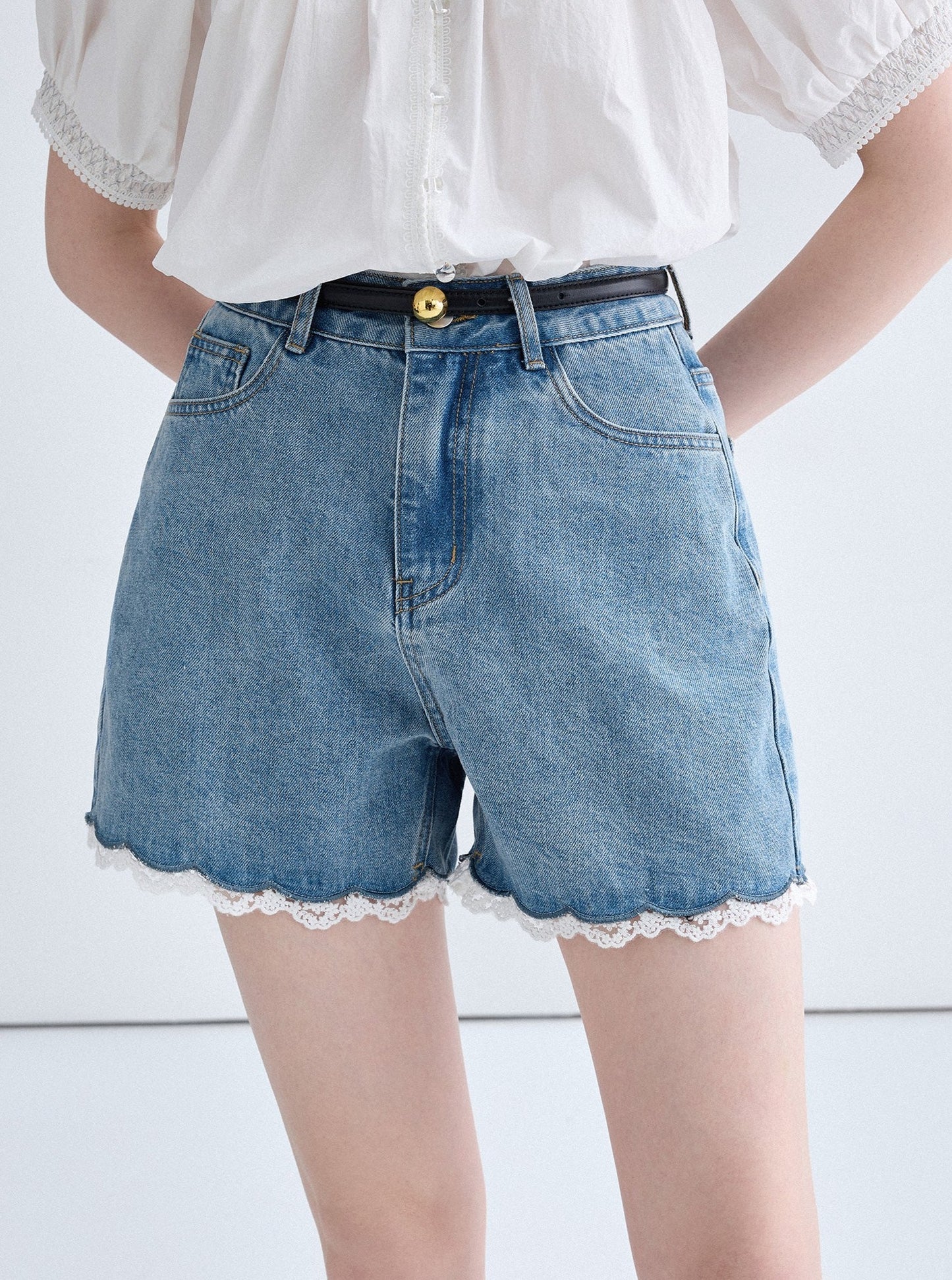 Spitze gewaschene Denim-Shorts