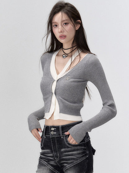 Cropped fake two irregular long sleeve knit top