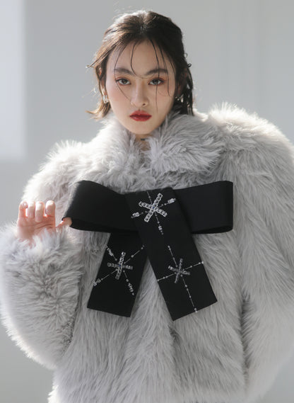 Hand-beaded bows embellished faux-fur coat