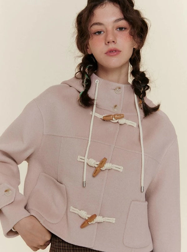 Long and short horn buttoned woolen Coat