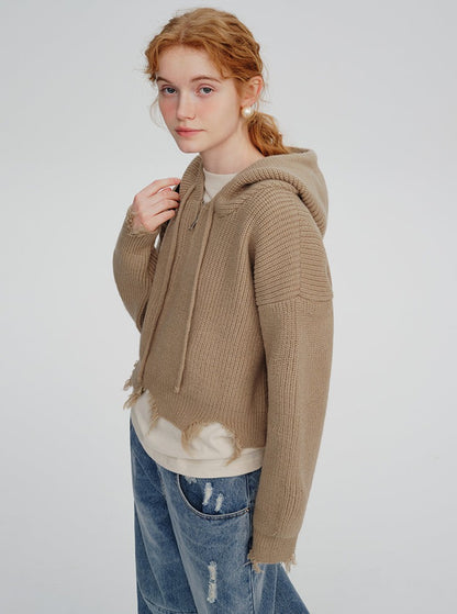 Half-zip hooded ripped sweater