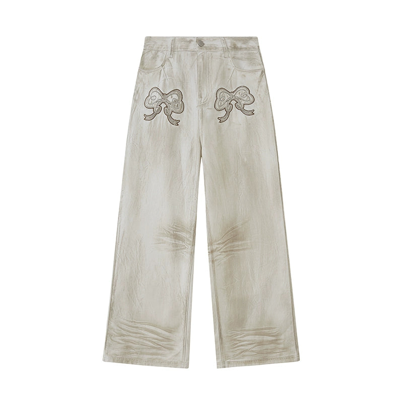 Comfortable Bow Appliqué Distressed Jeans