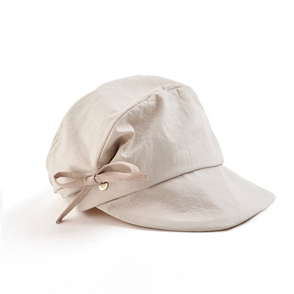 Elegante unregelmäßige Schirmmütze mit Falten