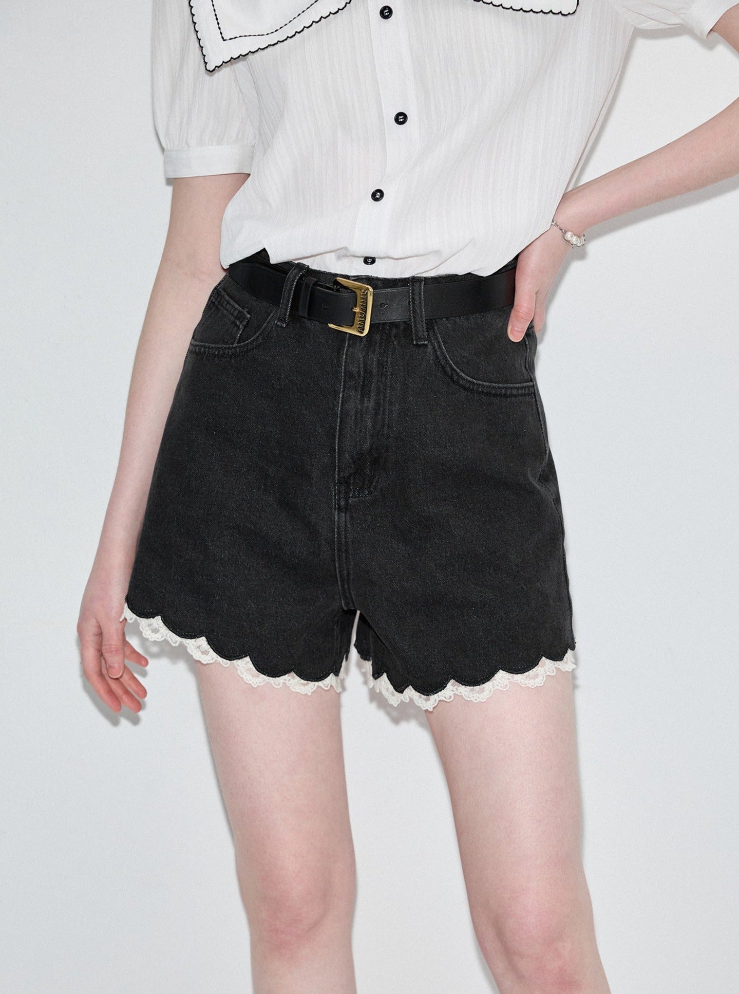 Spitze gewaschene Denim-Shorts