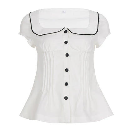 Blusa con cuello de muñeca con bloques de color