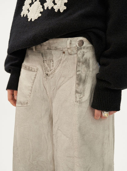 deconstructs patchwork dirty jeans pants