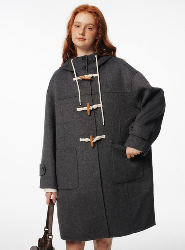 Long and short horn buttoned woolen Coat