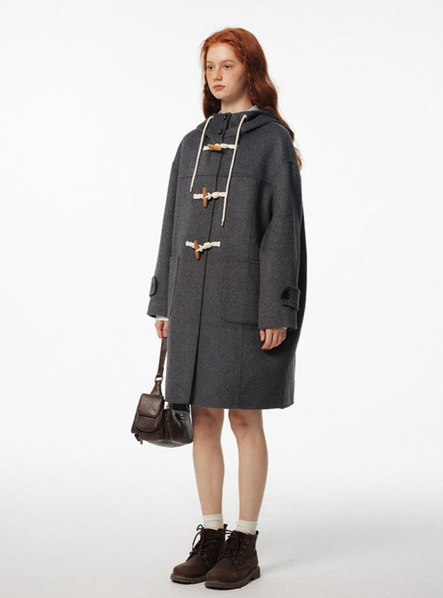 Long and short horn buttoned woolen Coat