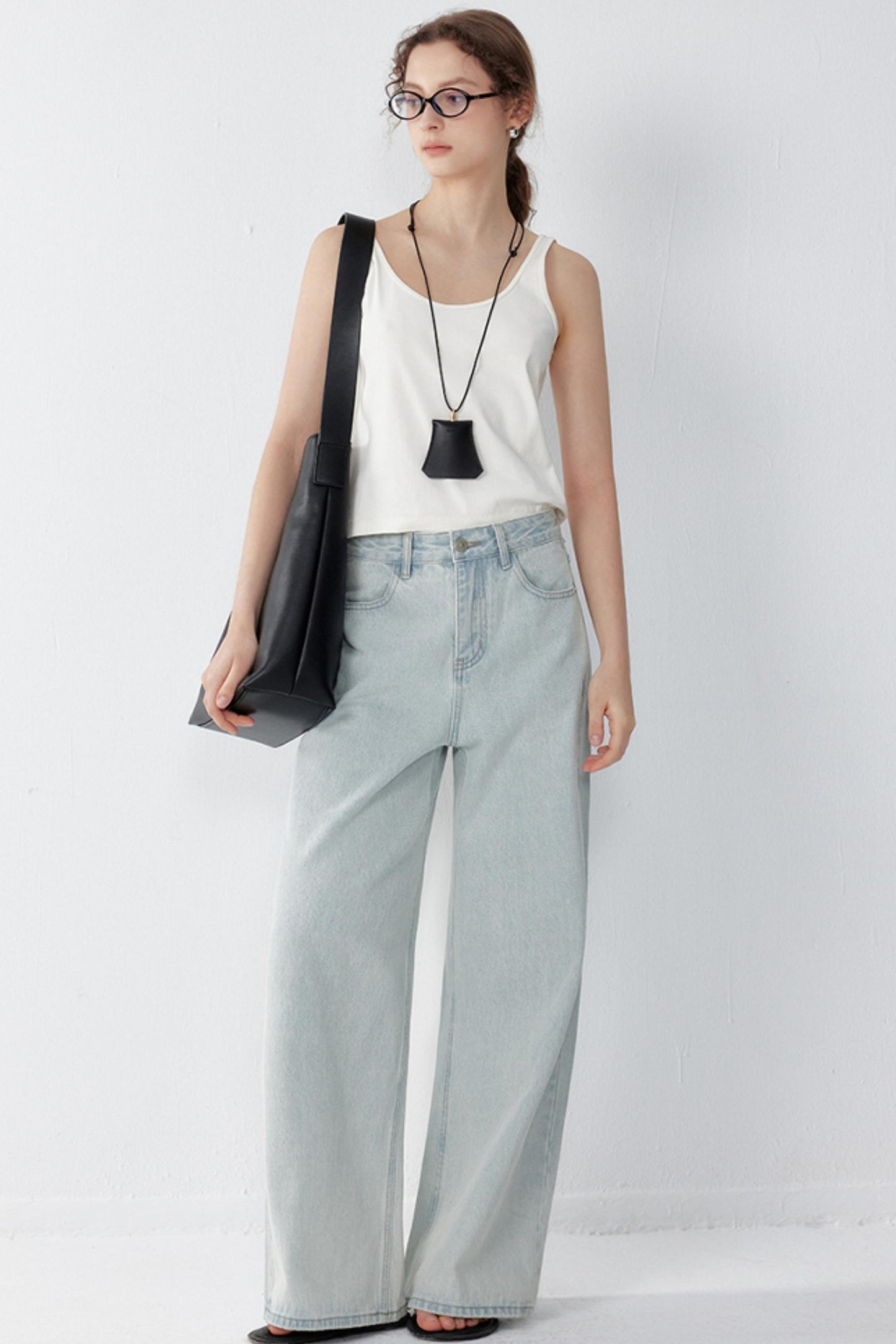 High-Waisted Distressed Jeans