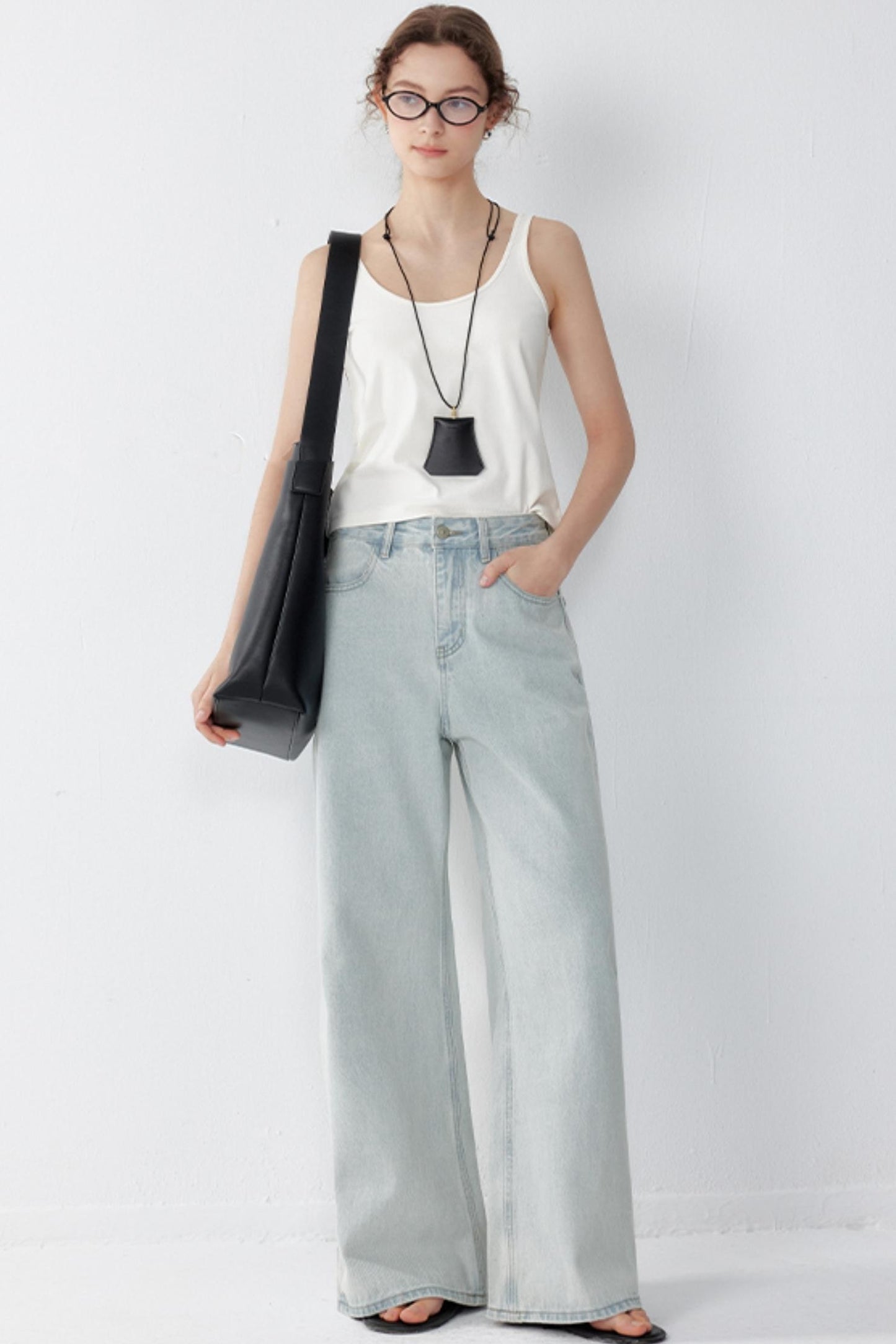 High-Waisted Distressed Jeans